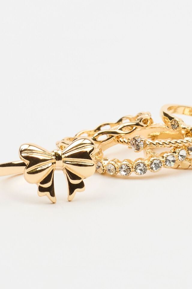 Women Garage Set Of 7 Bow & Gem Rings Gold | A-5284639